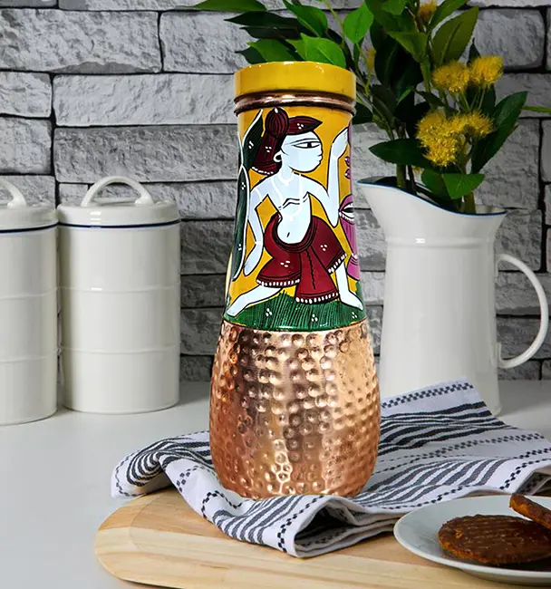 hammered copper surahi water bottle with traditional Indian design from Dirums